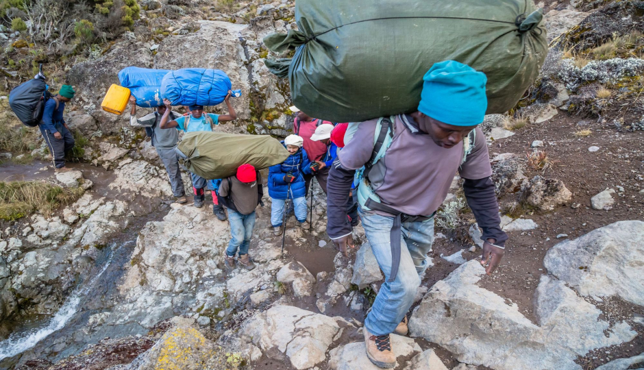 Image Post for Balancing Comfort and Conservation: How Many Porters Should Climb Kilimanjaro per One Climber?